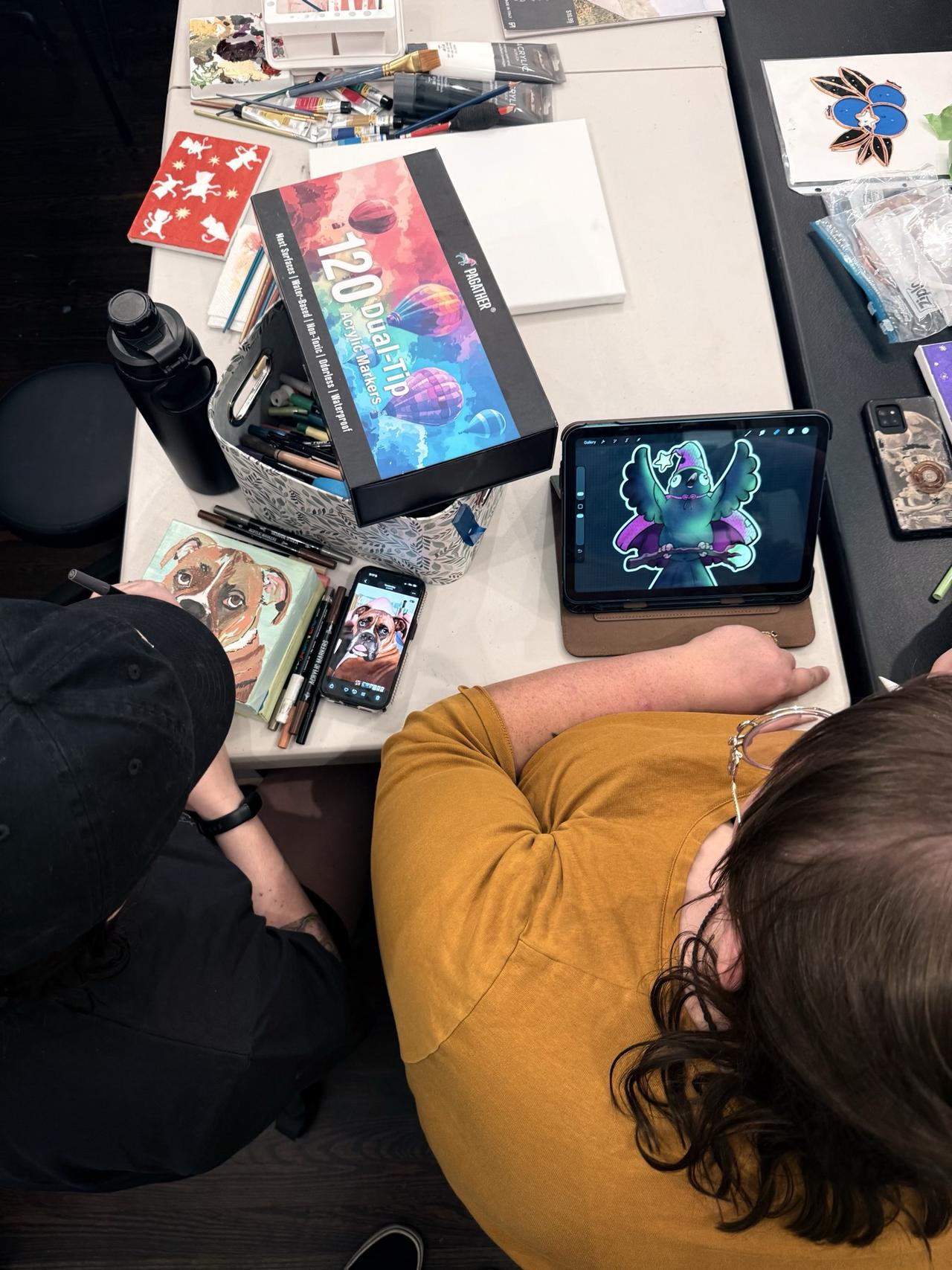 Participant working on an art activity at a table